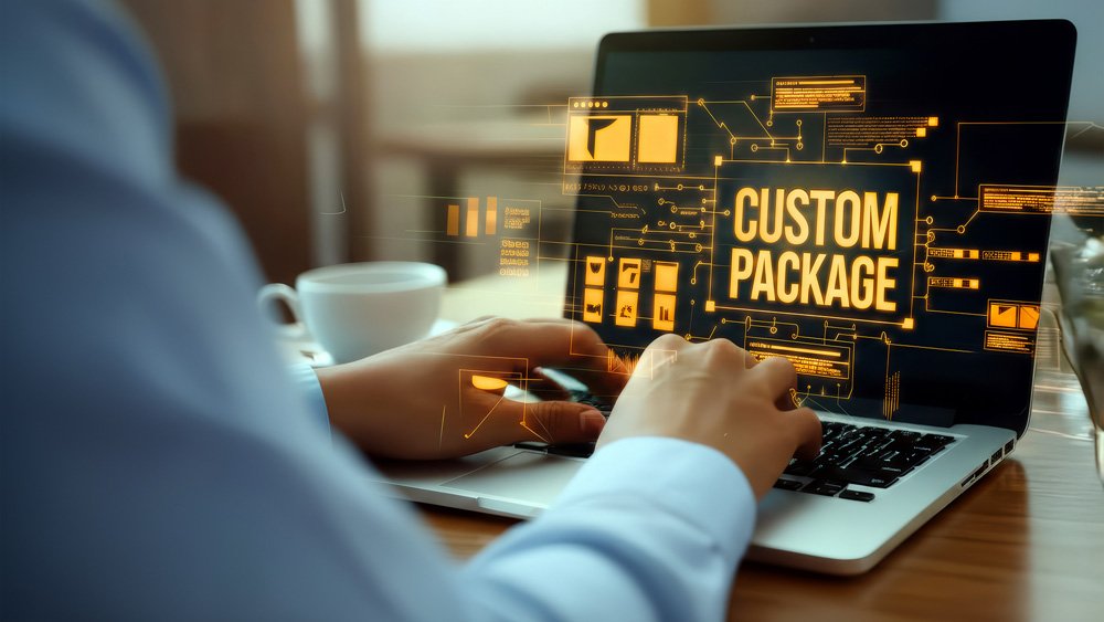 Person typing on a laptop in a modern workspace, with a digital overlay displaying “CUSTOM PACKAGE” surrounded by icons, data visualizations, and interface graphics representing software development and configuration tools